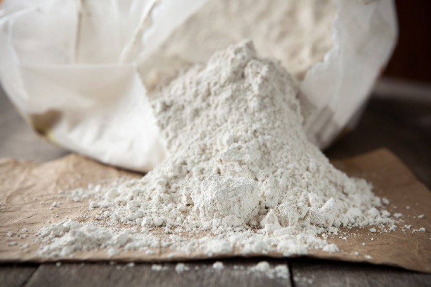 Photo of diatomaceous earth powder on the table